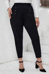 Spodnie damskie w dużych rozmiarach 6258