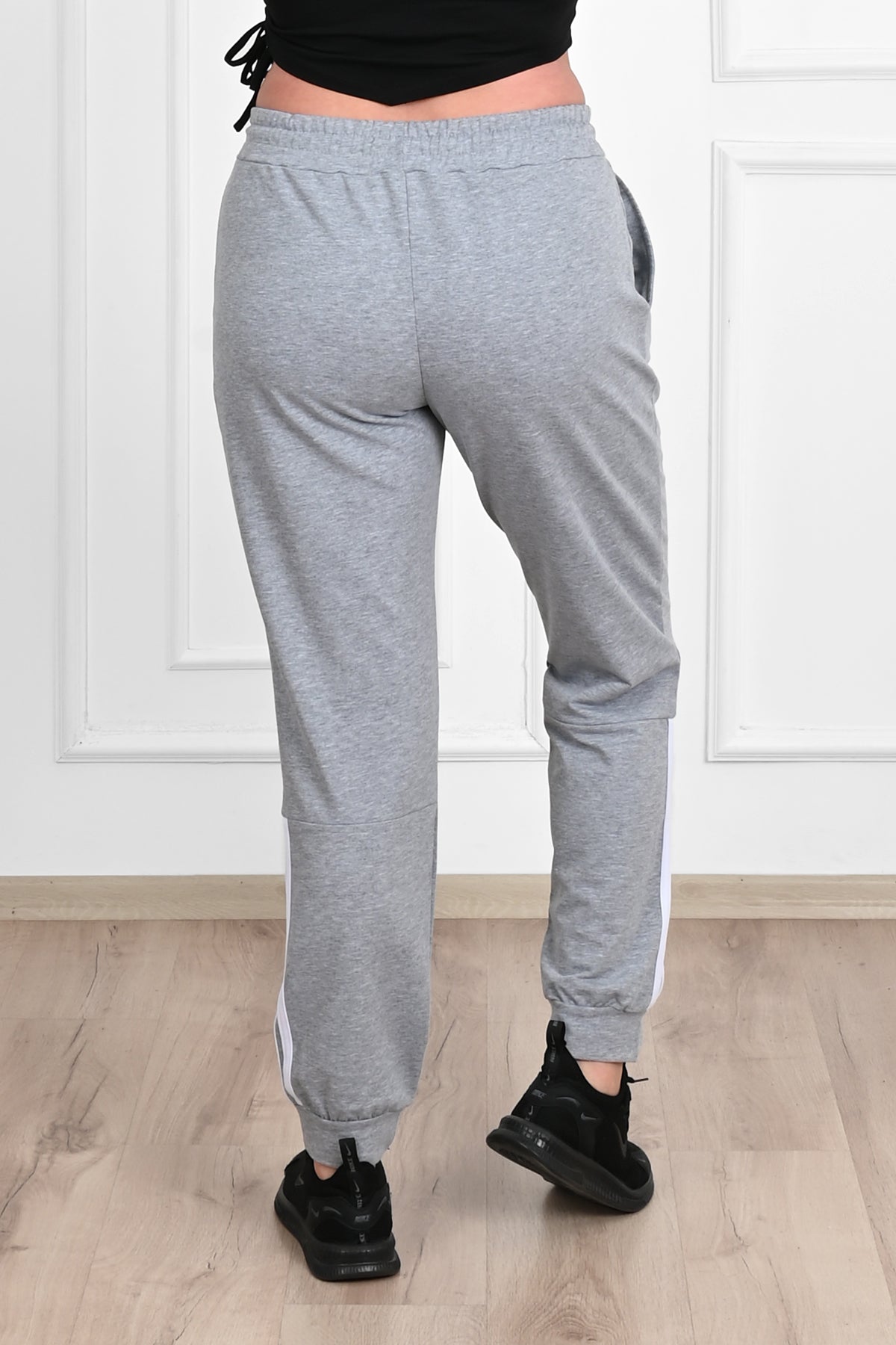 Damskie spodnie dresowe w paski, duże rozmiary 9046