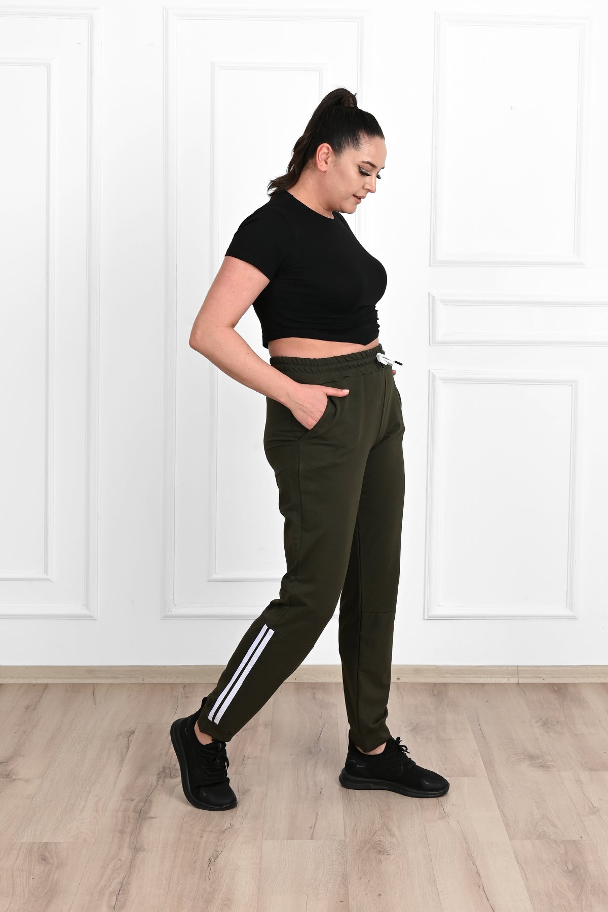 Damskie spodnie dresowe w paski, duże rozmiary 9046