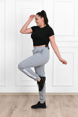 Damskie spodnie dresowe w paski, duże rozmiary 9046