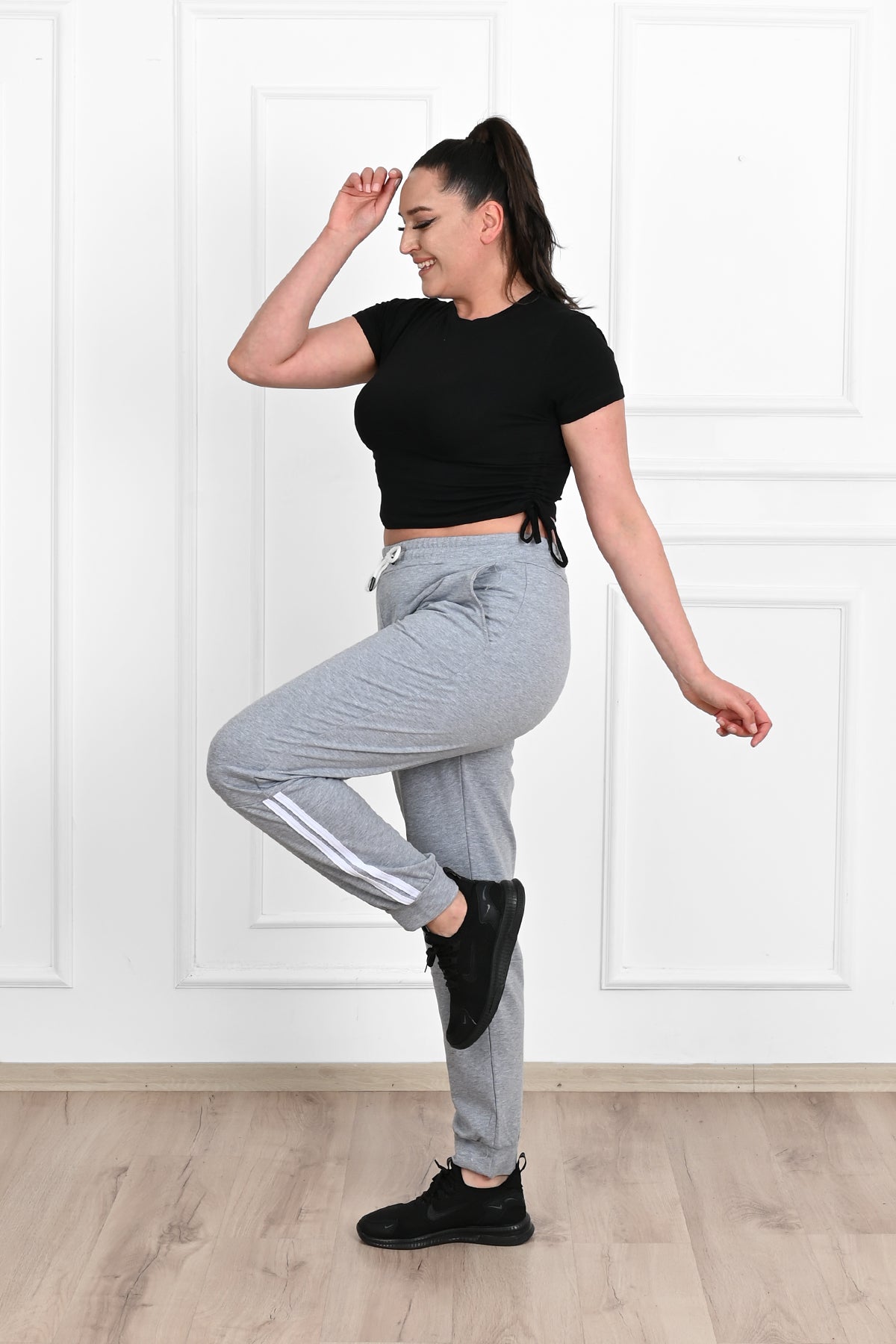 Damskie spodnie dresowe w paski, duże rozmiary 9046