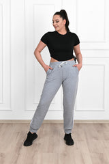 Damskie spodnie dresowe w paski, duże rozmiary 9046