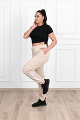 Damskie spodnie dresowe w paski, duże rozmiary 9046