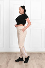 Damskie spodnie dresowe w paski, duże rozmiary 9046